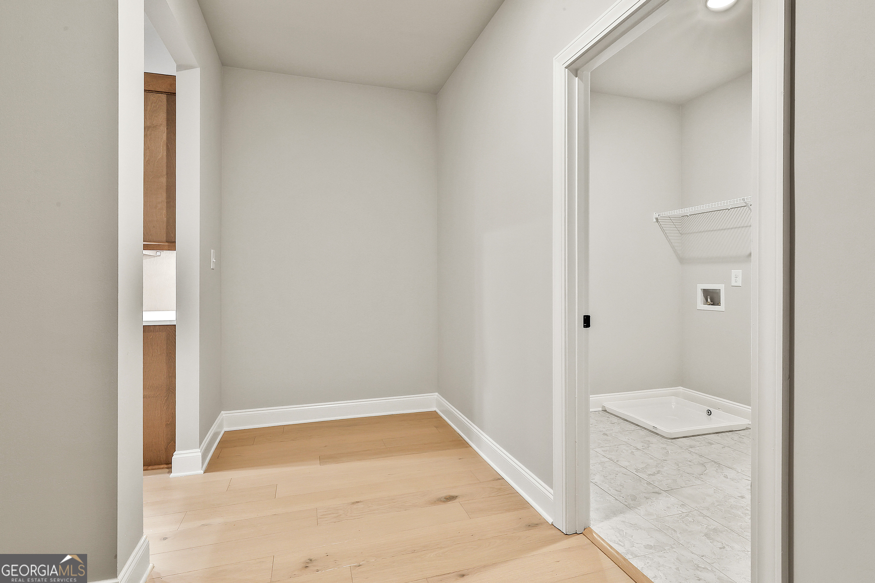 16 Nelson Way, Unit 38 Williamson, GA 30292 - Photo 25 of 44 a bathroom with a granite countertop sink and a mirror