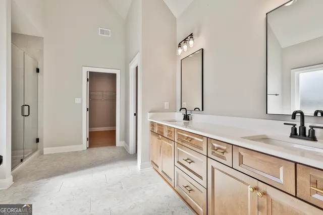 a bathroom with a bathtub and shower