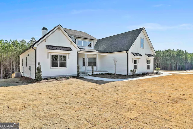 a view of a house with snow on the ground