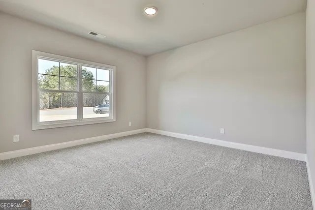 a bathroom with a double vanity sink toilet and shower