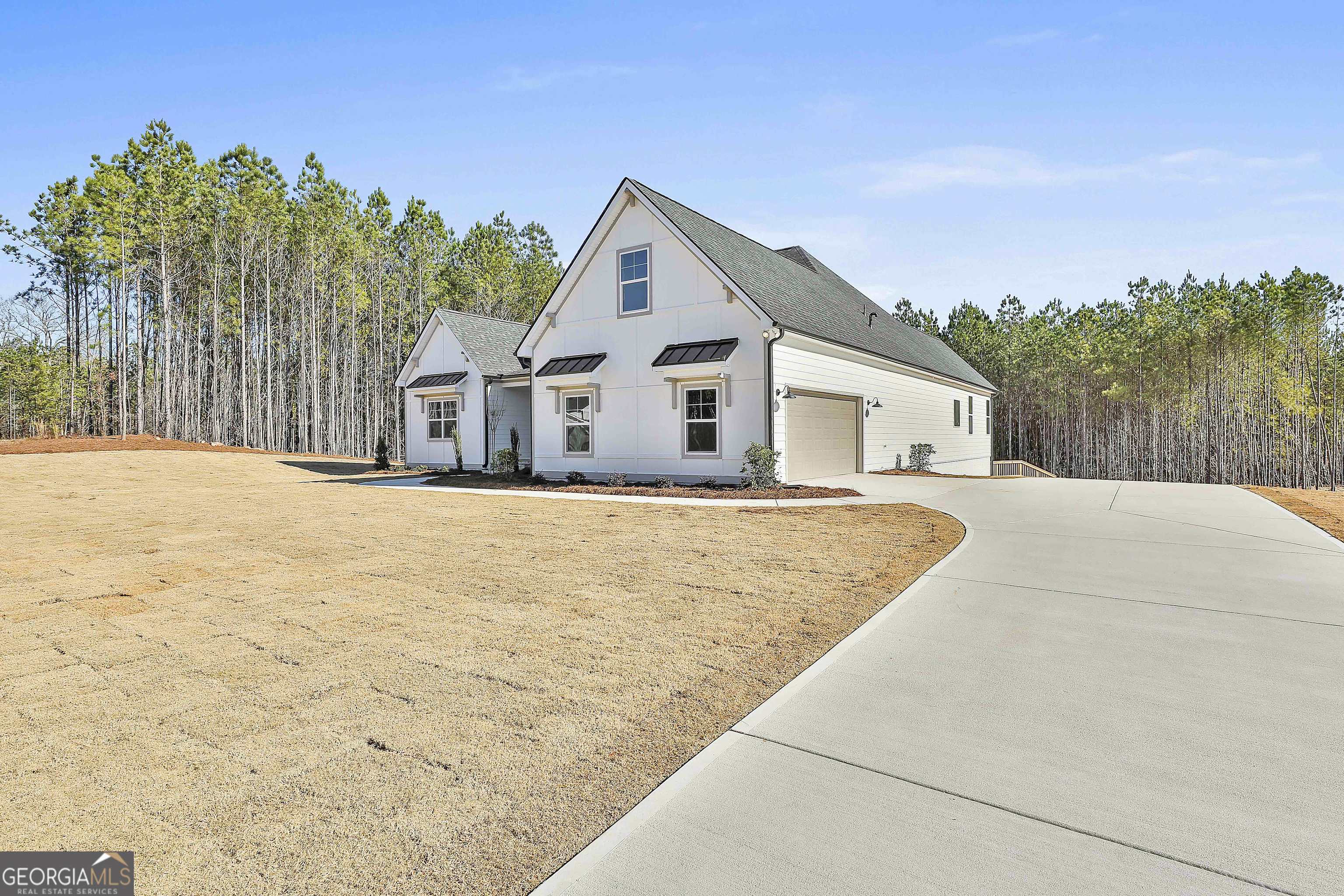 16 Nelson Way, Unit 38 Williamson, GA 30292 - Photo 4 of 44 a view of house with palm trees