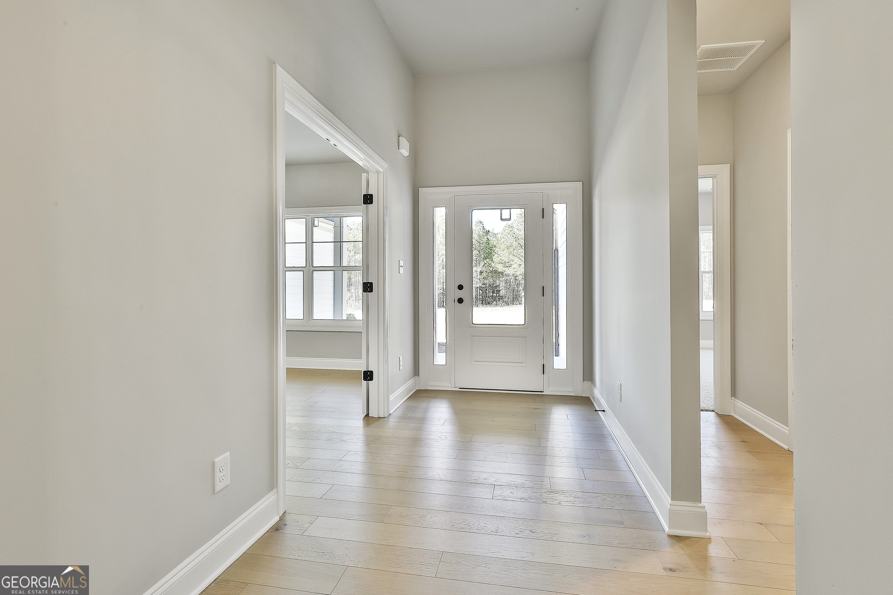 16 Nelson Way, Unit 38 Williamson, GA 30292 - Photo 8 of 44 a view of an entryway of a house and wooden floor in a house