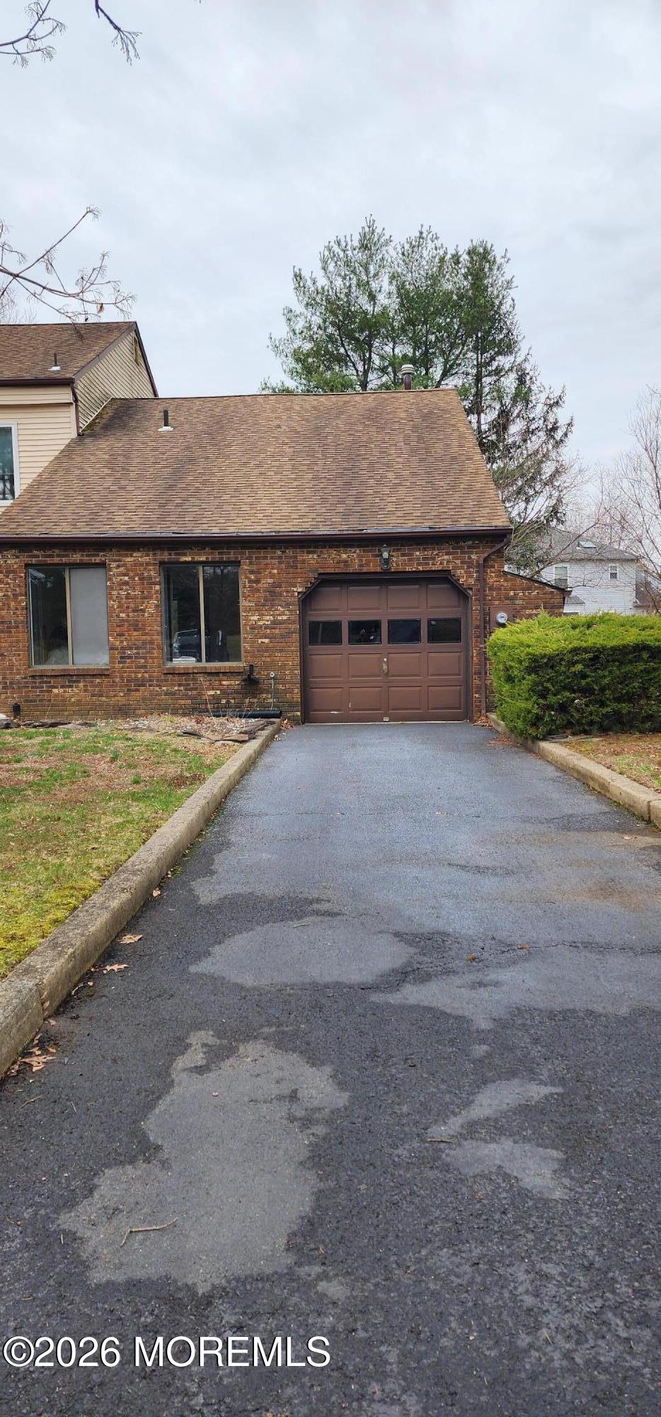 12 Coventry Court, Unit 12 Matawan, NJ 07747 - Photo 2 of 21 a view of a house with a yard