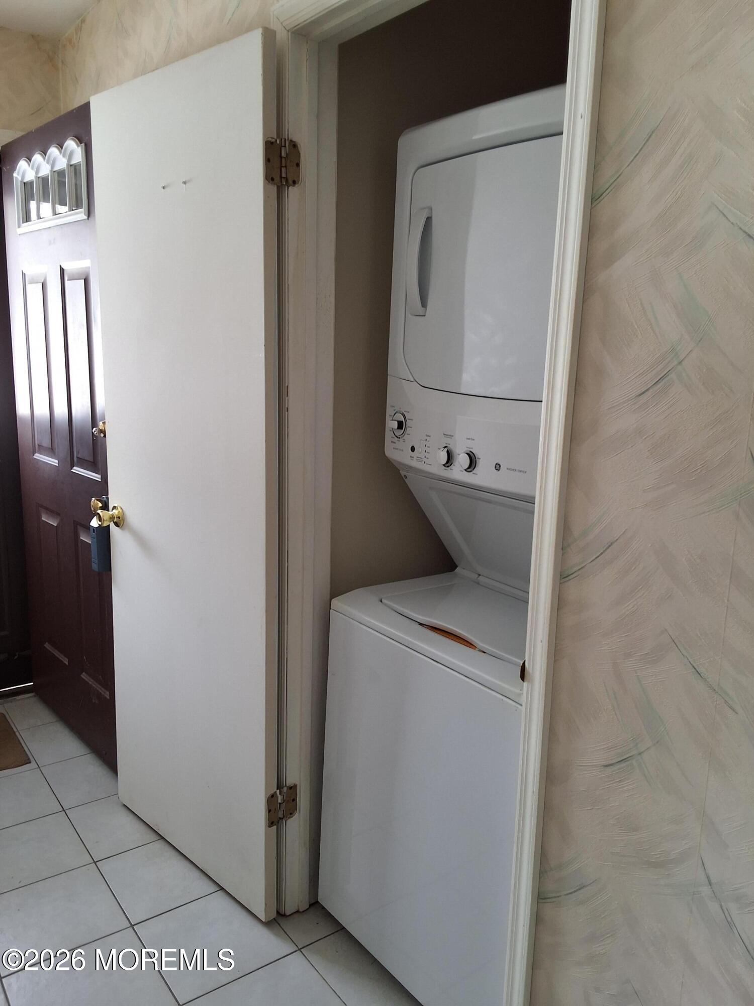 12 Coventry Court, Unit 12 Matawan, NJ 07747 - Photo 5 of 21 a utility room with dryer and washer