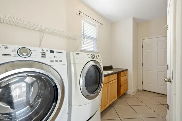 a utility room with dryer and washer