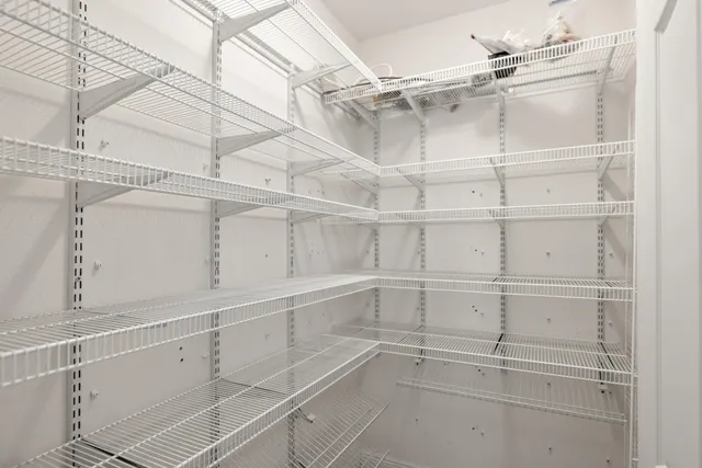 a view of a room with racks on the wall