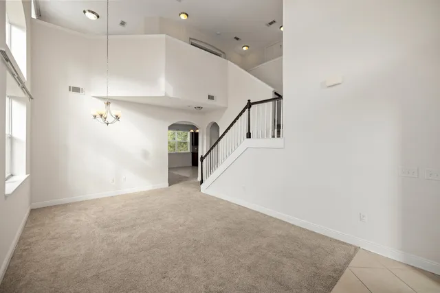 a view of a hallway with staircase