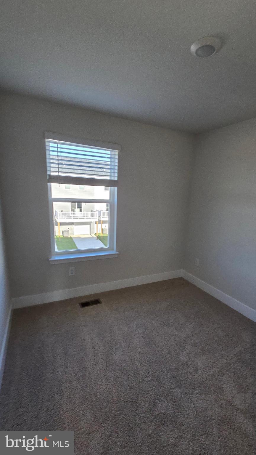 52 Aloma Street Ranson, WV 25438 - Photo 31 of 44 an empty room with a window