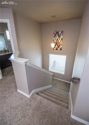 2095 Reed Grass Way Colorado Springs, CO 80915 - Photo 16 of 30 Upstairs landing area is bright with tons of natural light during the day.