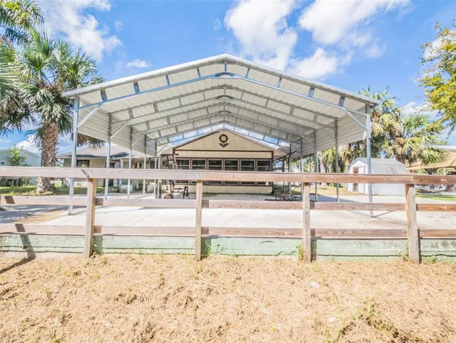 a view of a building with a snow on the side of it