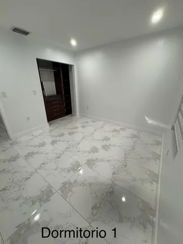 an empty room with a workbench