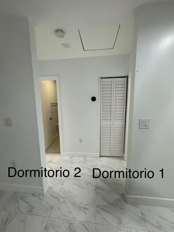 641 Southwest 35th Avenue Miami, FL 33135 - Photo 19 of 25 a view of a door with an carpet