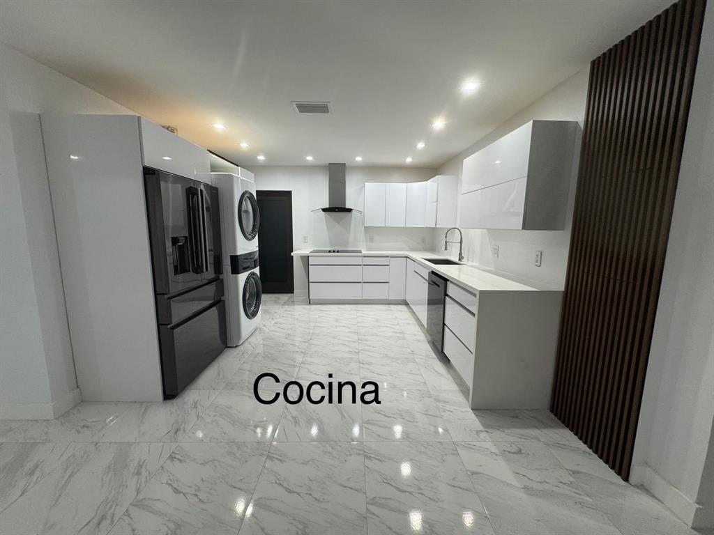 641 Southwest 35th Avenue Miami, FL 33135 - Photo 9 of 25 a view of kitchen with refrigerator sink and oven