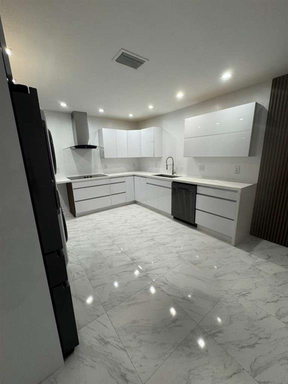 641 Southwest 35th Avenue Miami, FL 33135 - Photo 10 of 25 a kitchen with stainless steel appliances a refrigerator and a sink