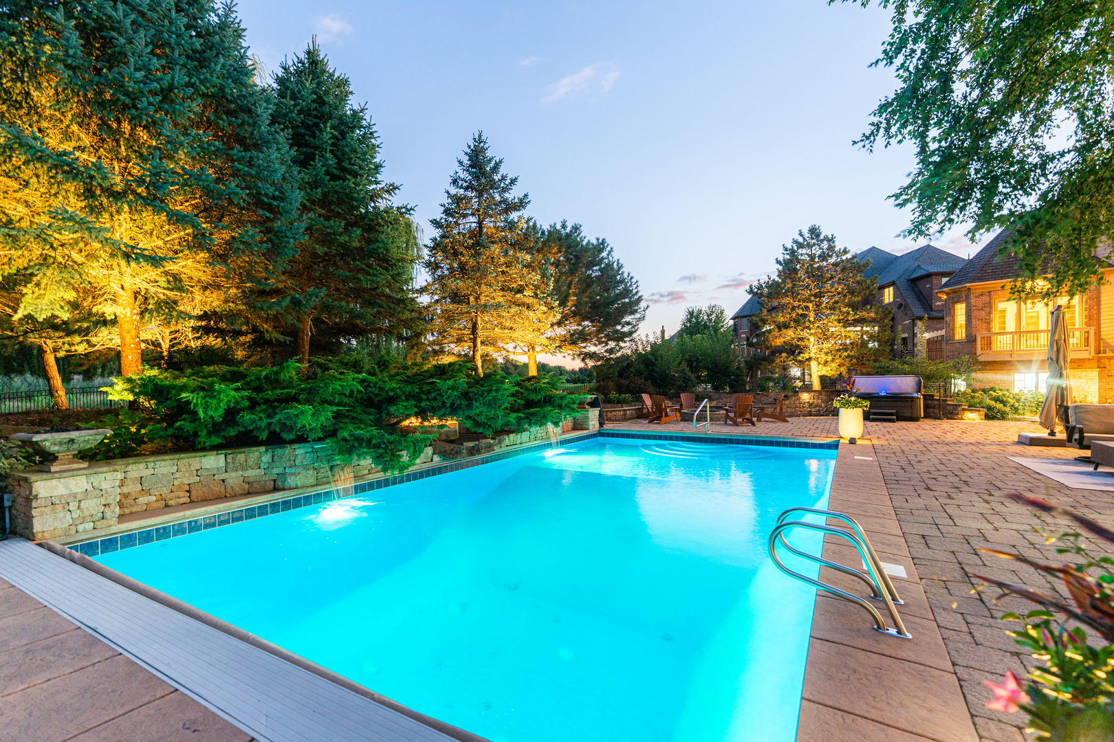 5N155 Prairie Rose Drive St. Charles, IL 60175 - Photo 129 of 148 a view of a swimming pool with an outdoor space and seating area
