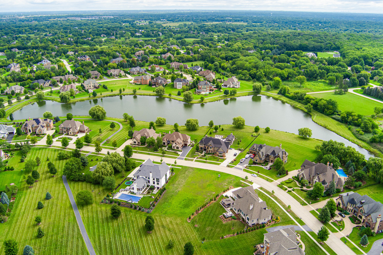 5N155 Prairie Rose Drive St. Charles, IL 60175 - Photo 145 of 148 an aerial view of a house with a lake view