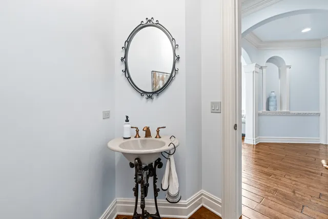 front view of a brick house with a large window