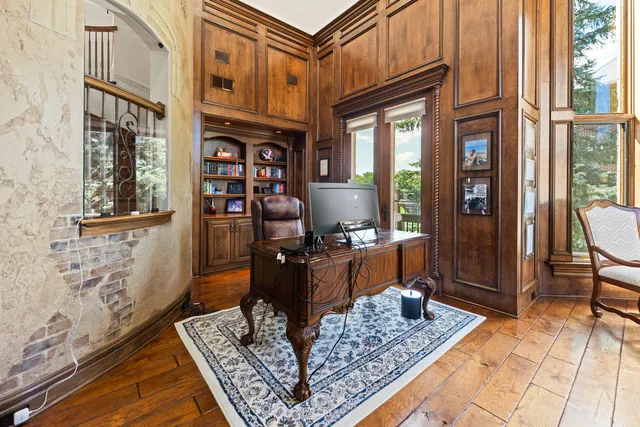 a living room filled with furniture and a window