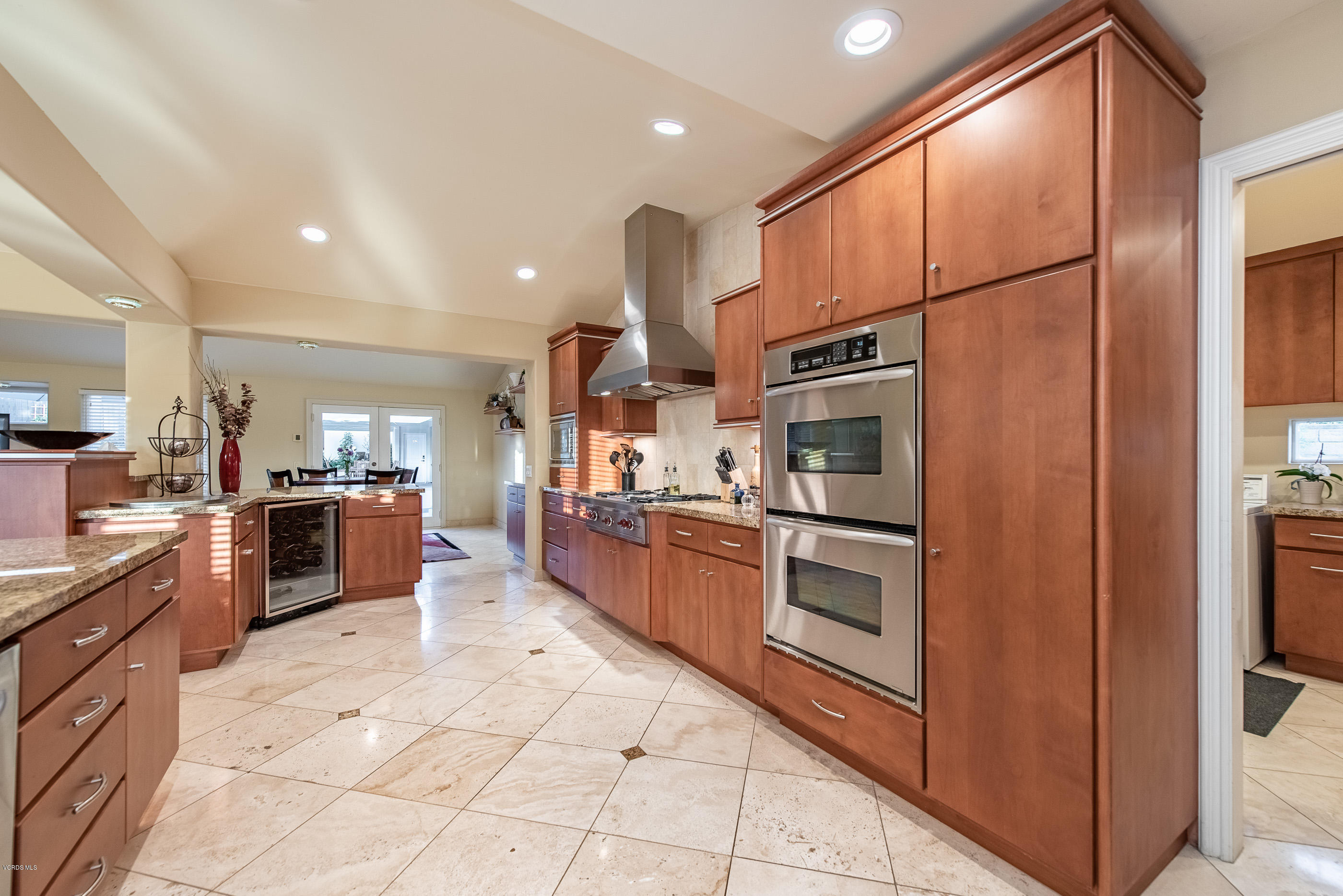 1628 Riente Street Camarillo, CA 93010 - Photo 14 of 91 a kitchen with stainless steel appliances granite countertop a refrigerator and a stove top oven