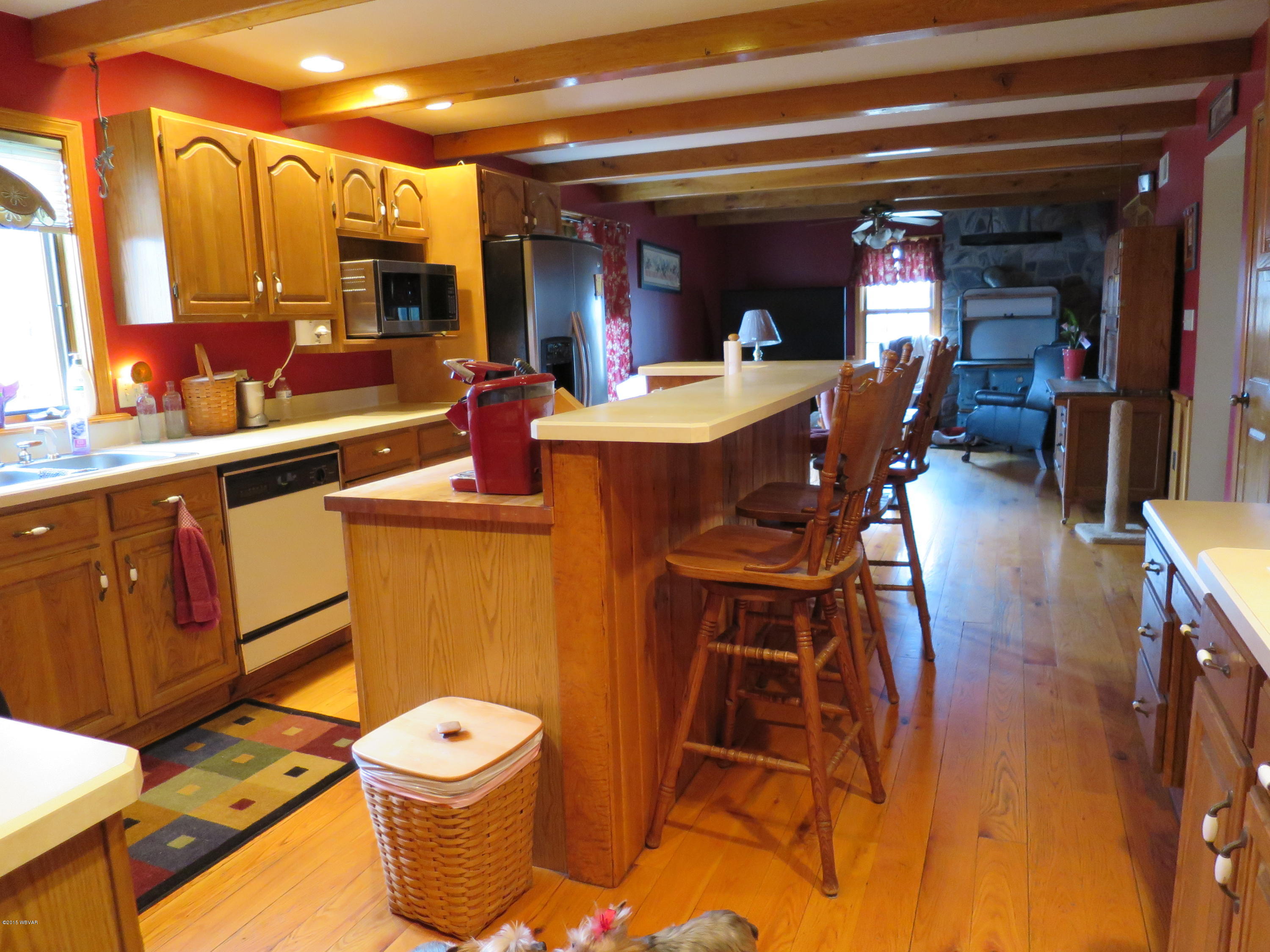 36 Bastian Road Montgomery, PA 17752 - Photo 3 of 15 Kitchen with familyrm in distance.JPG