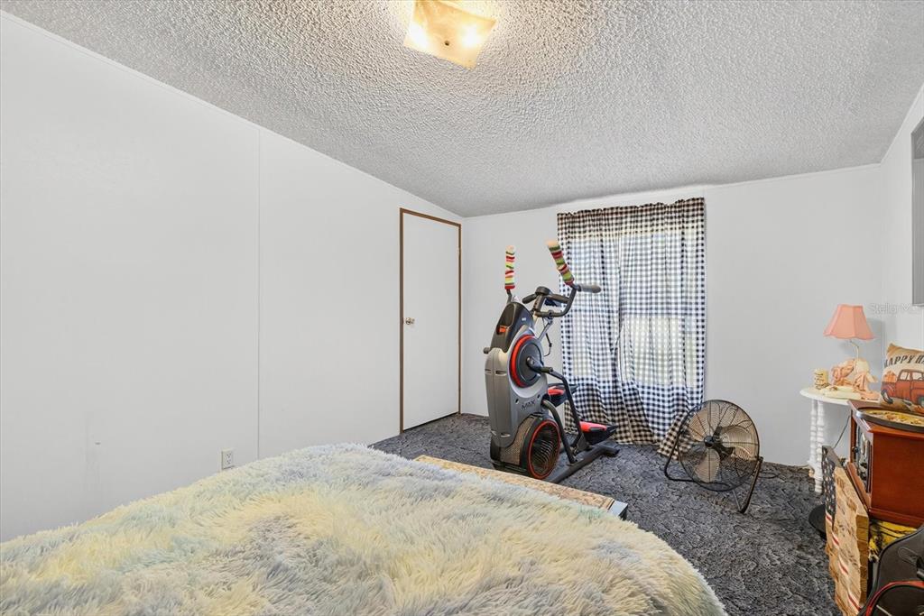 5280 Golddust Road Spring Hill, FL 34609 - Photo 18 of 41 a view of a room with gym equipment