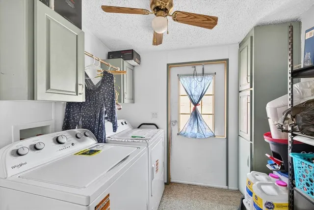 a room that has a bed and a tv in it