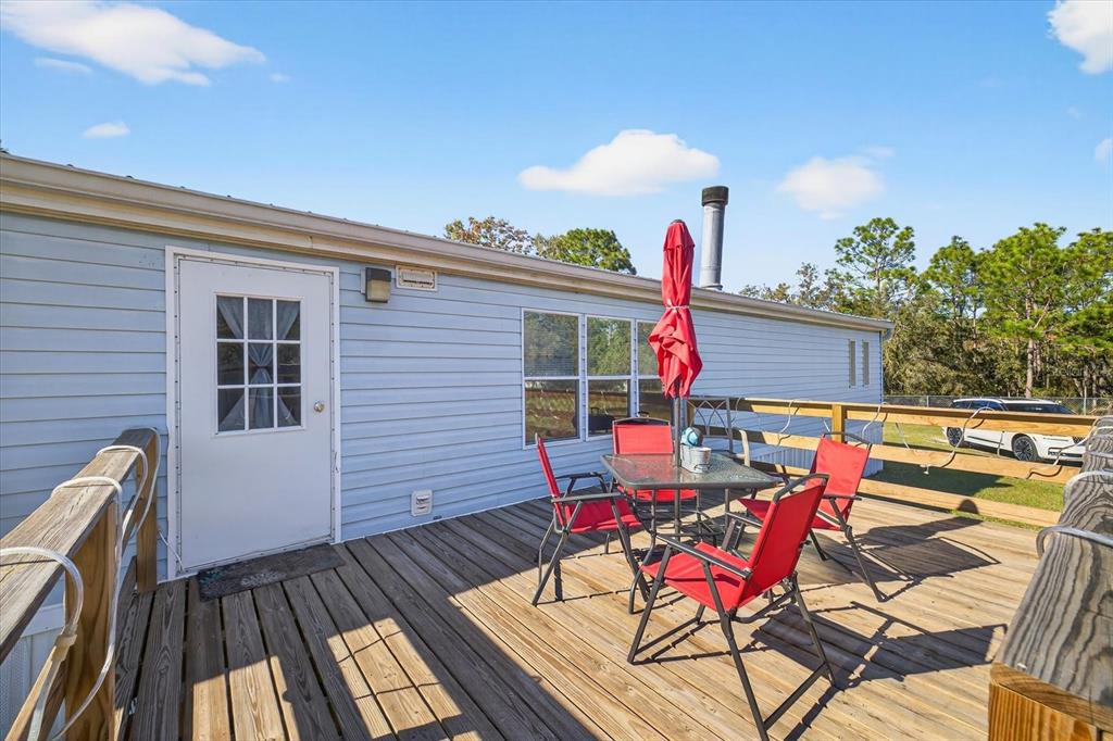 5280 Golddust Road Spring Hill, FL 34609 - Photo 27 of 41 a view of a house with sitting area