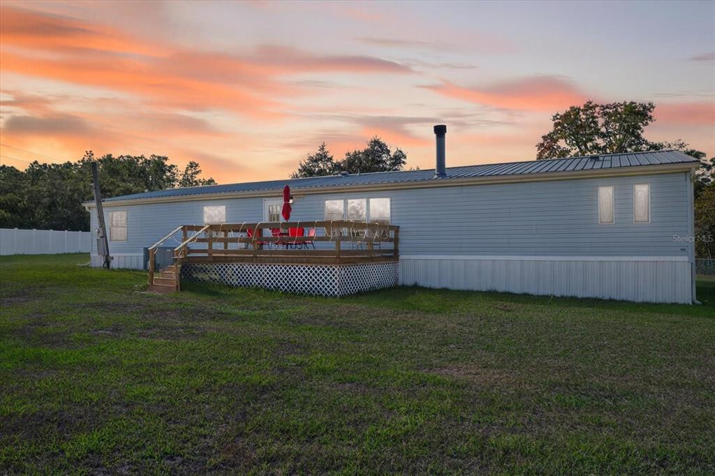 5280 Golddust Road Spring Hill, FL 34609 - Photo 31 of 41 a house view with a garden space