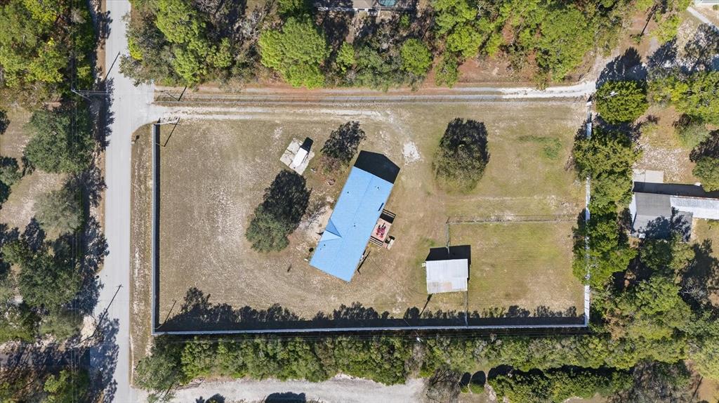 5280 Golddust Road Spring Hill, FL 34609 - Photo 40 of 41 an aerial view of a house with a yard and a fountain