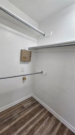 a view of a room with racks on the wall