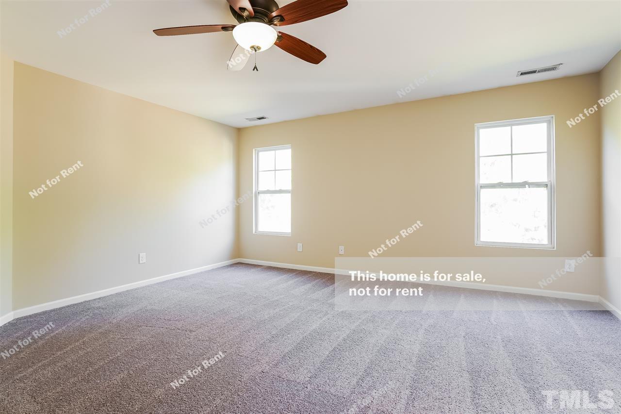 4439 Stonewall Drive Raleigh, NC 27604 - Photo 15 of 27 a view of an empty room with a window