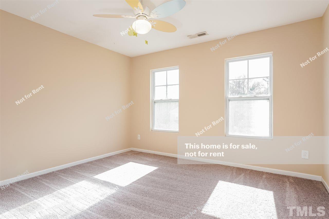4439 Stonewall Drive Raleigh, NC 27604 - Photo 20 of 27 a view of an empty room with a window