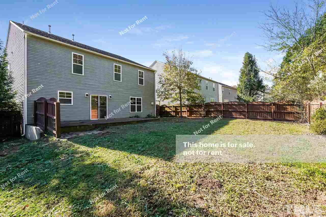 4439 Stonewall Drive Raleigh, NC 27604 - Photo 27 of 27 a view of a backyard of the house