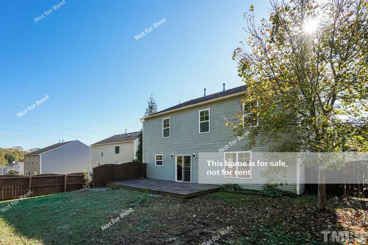 4439 Stonewall Drive Raleigh, NC 27604 - Photo 7 of 27 a view of a house with a yard