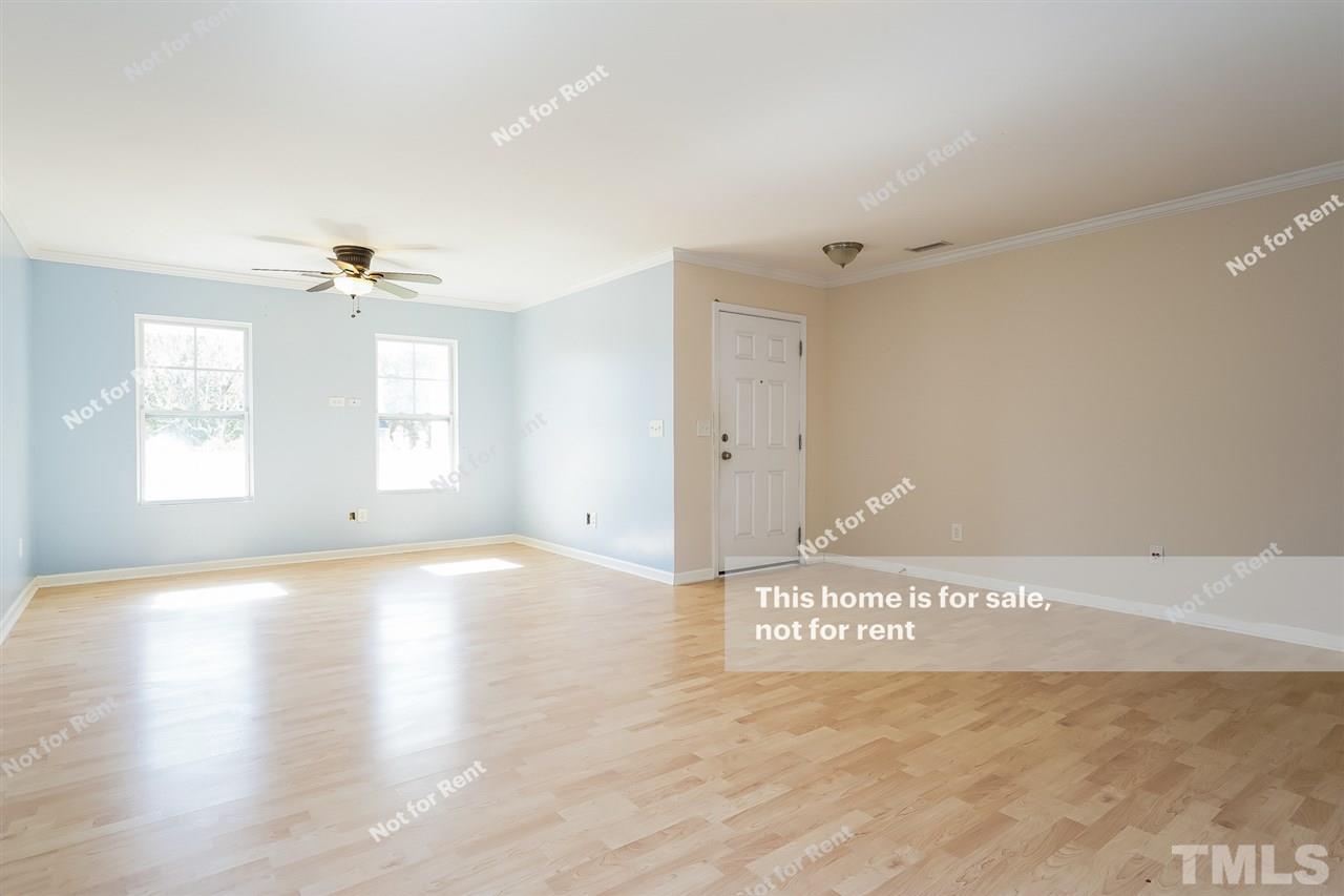 4439 Stonewall Drive Raleigh, NC 27604 - Photo 9 of 27 a view of an empty room with a window