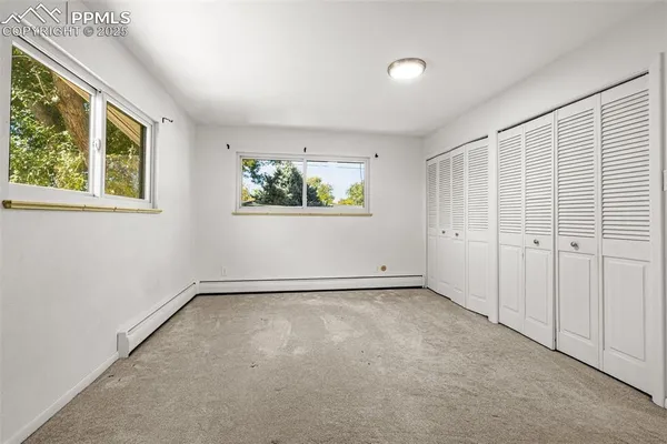 an empty room with windows