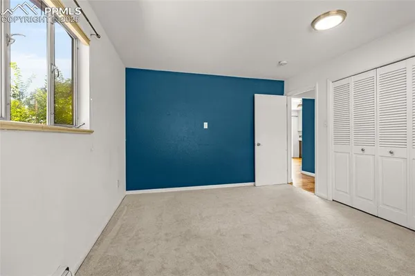 a view of a livingroom with a staircase