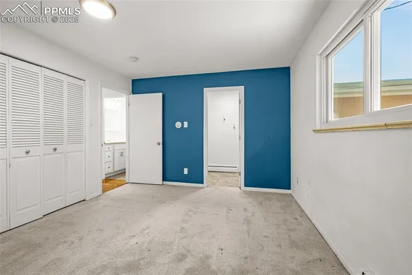 a view of empty room with windows