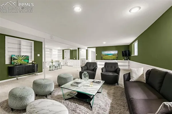 a living room with furniture and a couch