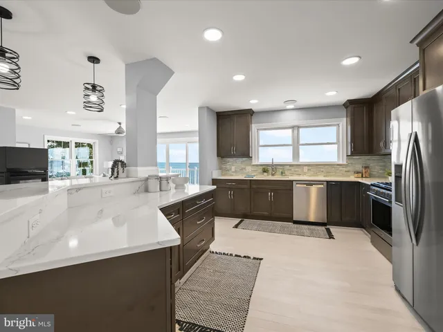 a bathroom with a double vanity sink a mirror and a