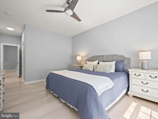 a view of small house with a yard