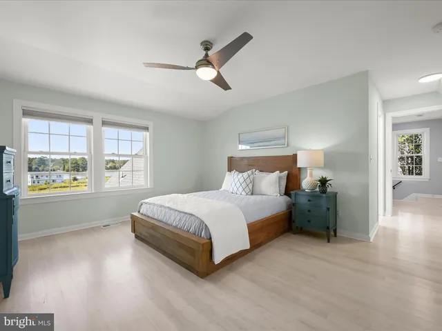 an aerial view of a house with a lake view