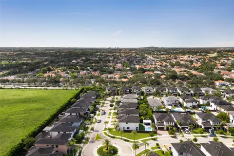 an aerial view of a city with lots of residential buildings