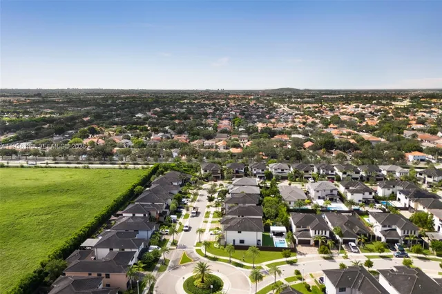 an aerial view of a city with lots of residential buildings