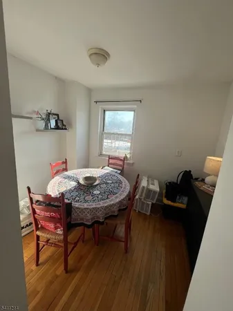 a bedroom with a bed and a table in it