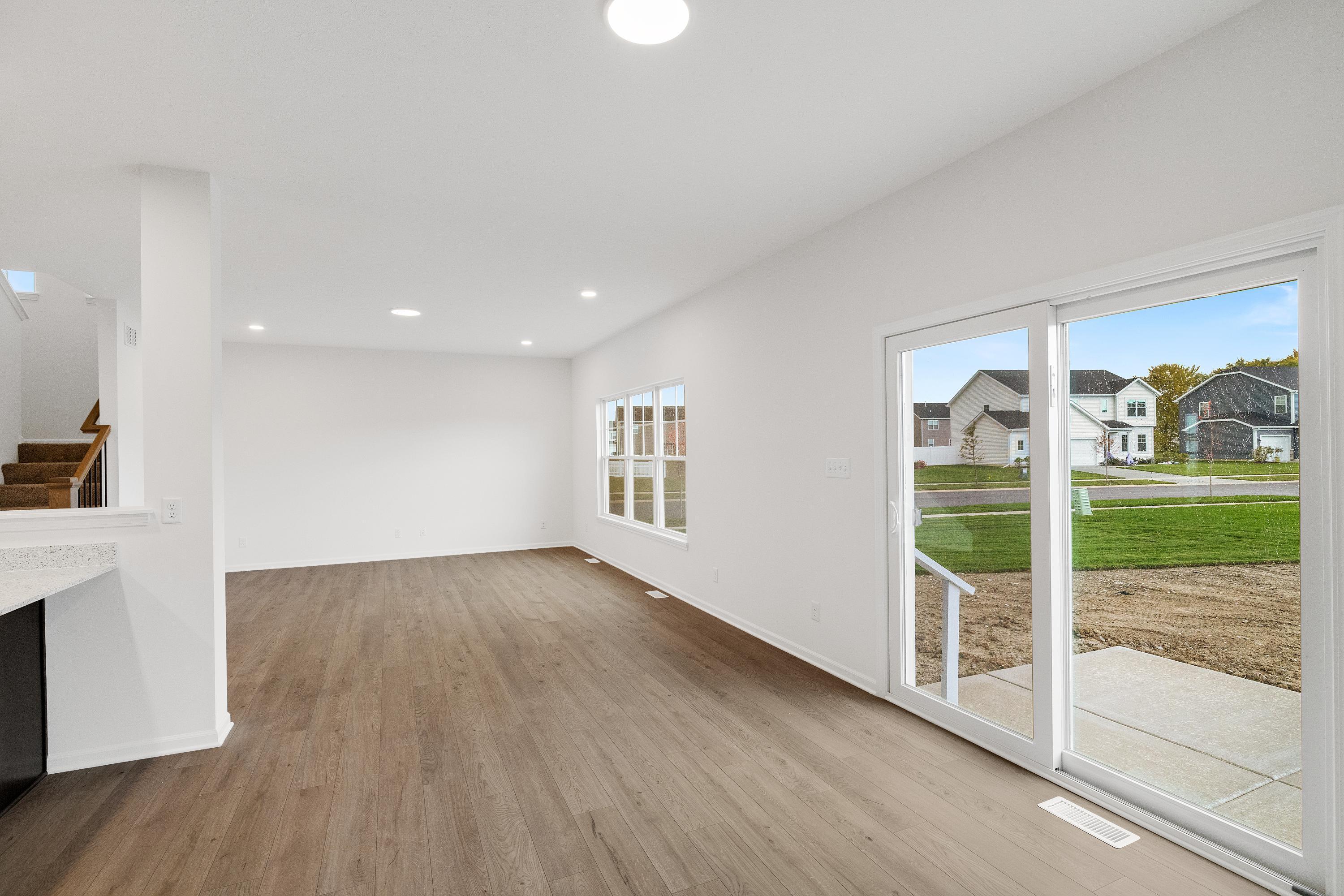 13080 Carolina Street Crown Point, IN 46307 - Photo 10 of 23 a view of a livingroom with wooden floor and entryway