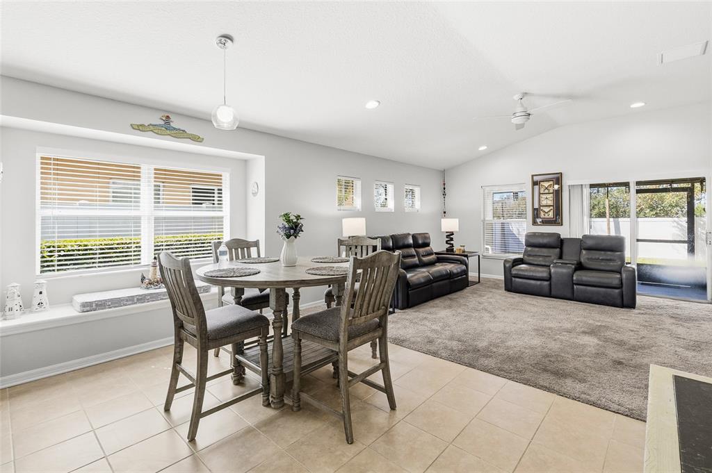 6641 Boulder Run Loop Wesley Chapel, FL 33545 - Photo 14 of 43 a living room with furniture and a large window