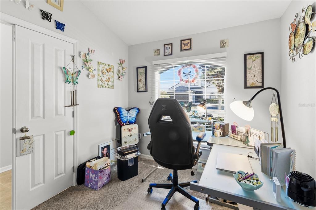 6641 Boulder Run Loop Wesley Chapel, FL 33545 - Photo 32 of 43 a workspace with furniture and wall paintings