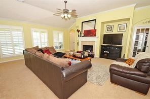 25411 Overbrook Terrace Lane Katy, TX 77494 - Photo 5 of 30 Spacious great room with a wall of windows that allows ample natural light.