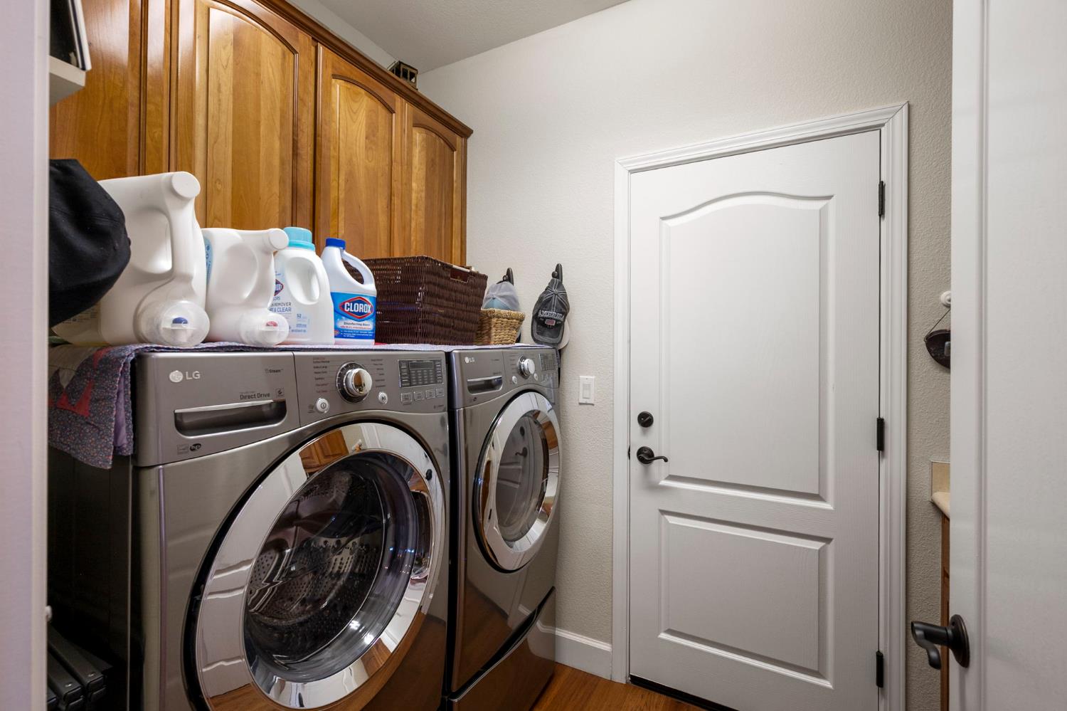 352 Mitchell Lake Lane Copperopolis, CA 95228 - Photo 25 of 47 Laundry Room with Cherry Cabinetry - Washed and Dryer Stay